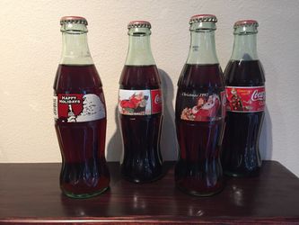 Vintage Coca-Cola bottles, never opened