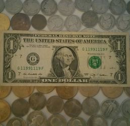 U.S. $1 bill with binary serial number#G11991119F