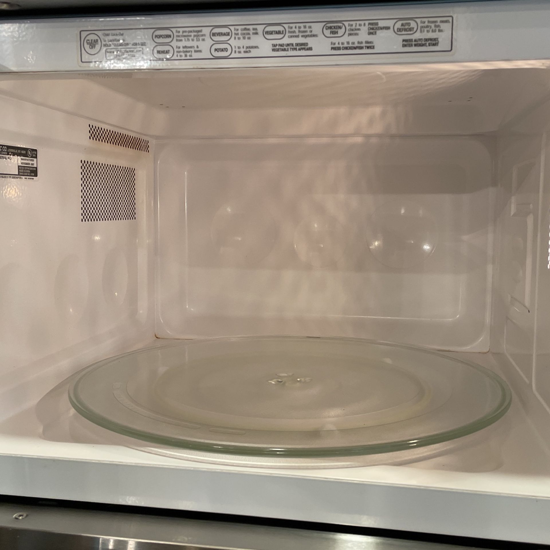 Ge monogram 2024 microwave ze2160sf