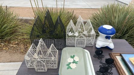Three Different Size Birdcages Two White And One Black