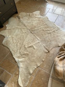 Ivory Printed Faux Cowhide Area Rug from World Market (Made in Brazil)