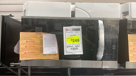 LG  1 year warranty- Microwave- H: 16.44 in, W: 29.88, D: 15.38 in.