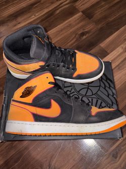 Jordan 1 Mid SE black vivid orange color way