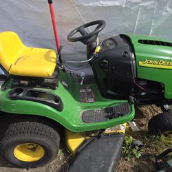 John Deer Riding Lawn Mower Make Offer