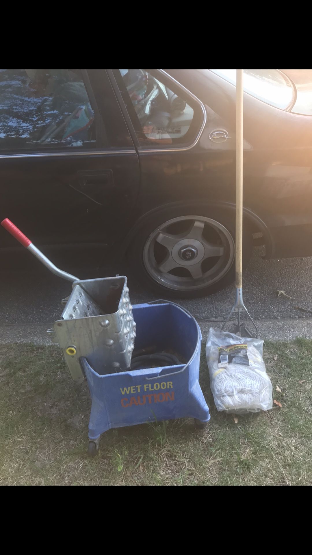 Nice Commercial Rollaround Mop Bucket With Ringer And New Mop Head And Handle Everything Goes For $50