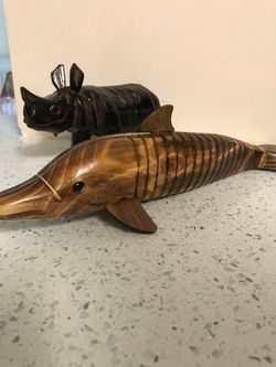 Gorgeous Hand Carved  And Hand Painted  Wooden  Animal Figurines.  Fish is 12.5 inch L and 3.5 inch H and a Rhinoceros L -8 inch and H- 4.5 inch.