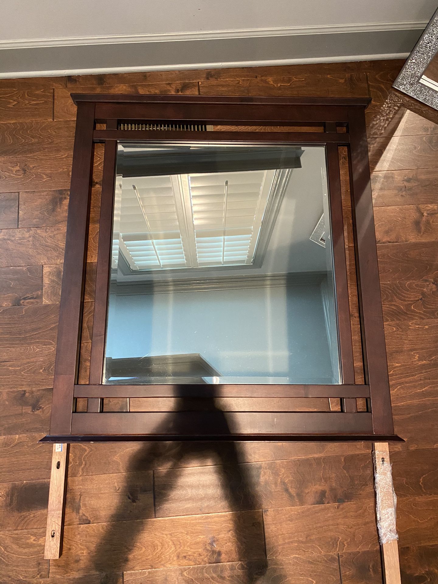 Large wood framed mirror