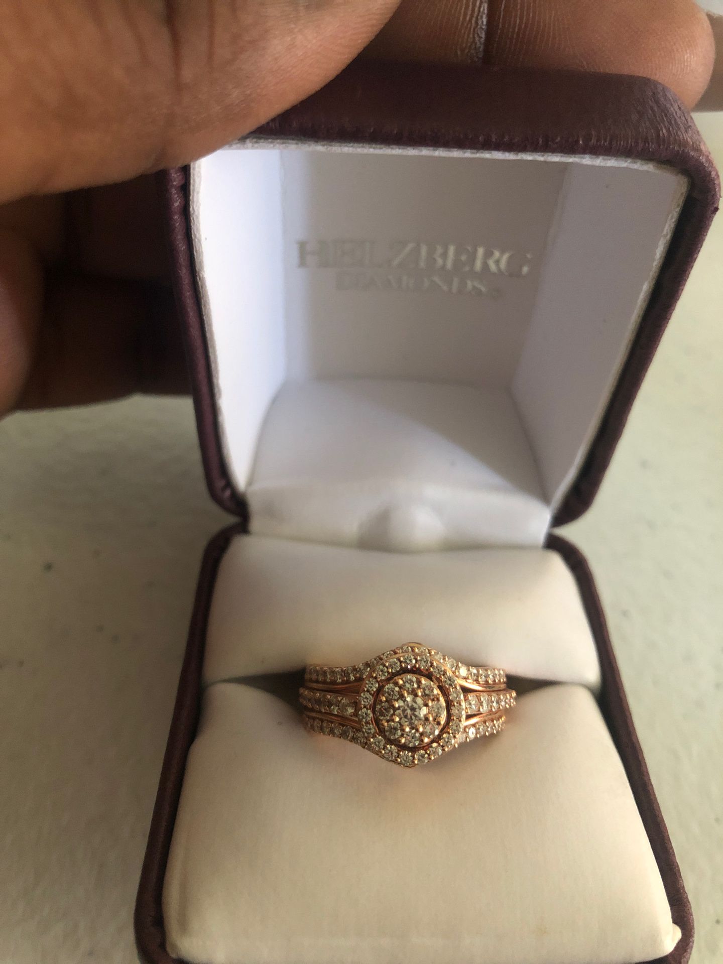 14 karat rose gold composite top bridal ring containing 88 round brilliant cut diamonds