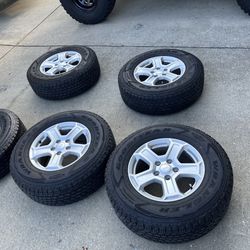 Goodyear Wrangler all terrain tires 245/75R17  And Jeep Wrangler Wheels