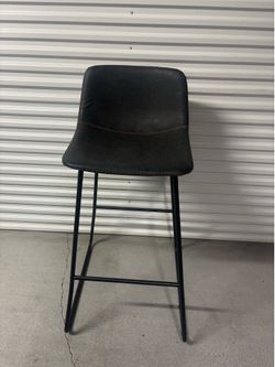 2 High top table with 4 chairs.