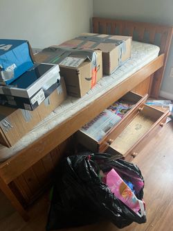 light brown twin bed with storage 300 OBO