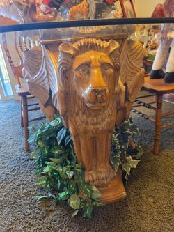 Lion table carved out of one piece of wood glass. Tabletop perfect four chairs