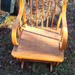One Heavy Duty Wooden Rocking Chair