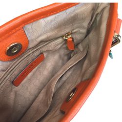 Michael Kors Orange Crossbody Bag and additional attached MK Key