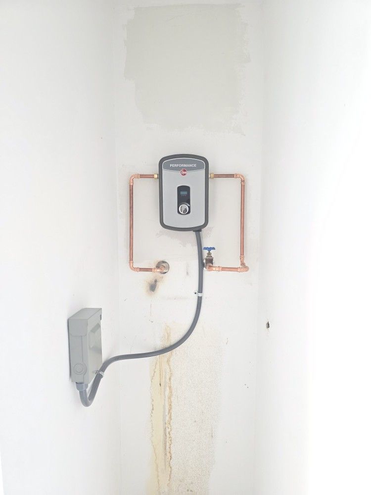 Rheem Tankless Water Heater Brand New
