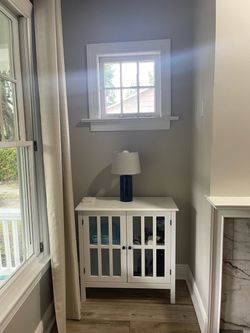 White Wood Cabinet with Glass Panel