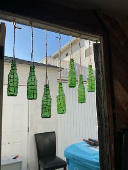 Hanging glass bottles