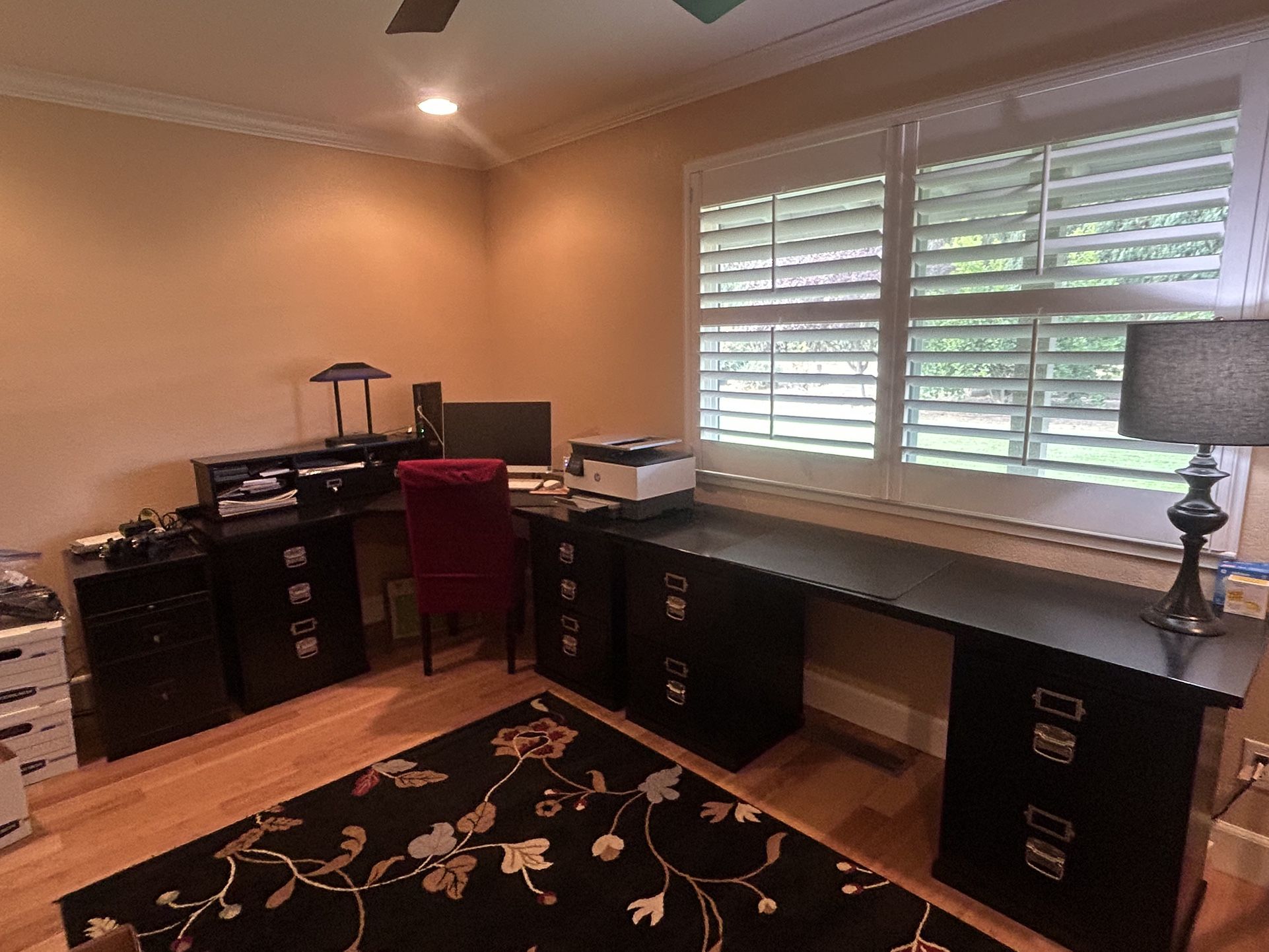 Ballard designs black modular desk - solid wood. Has 7 file cabinets and 5 drawers and charging deck Computer,printer lamp not included