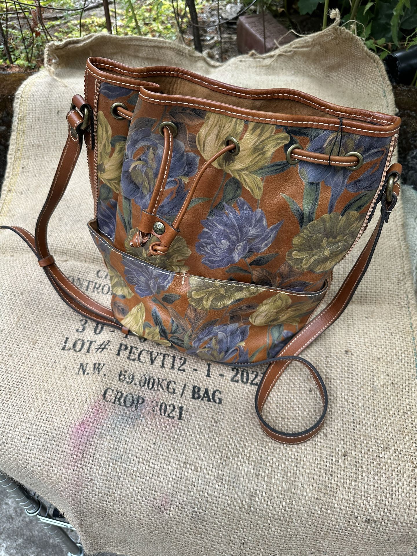 Patricia Nash Shoulder Bag With Drawstring Closure.