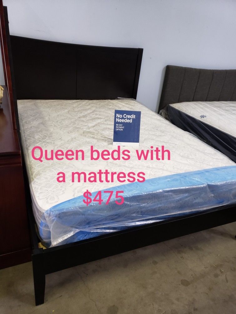 Queen Bed Frame With A Mattress $475