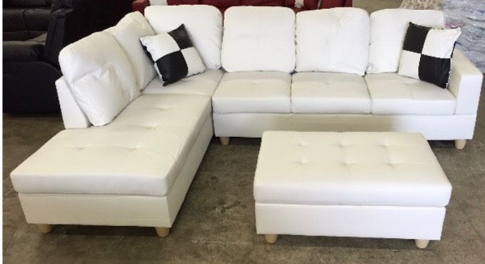 White Leather Sectional Couch And Ottoman