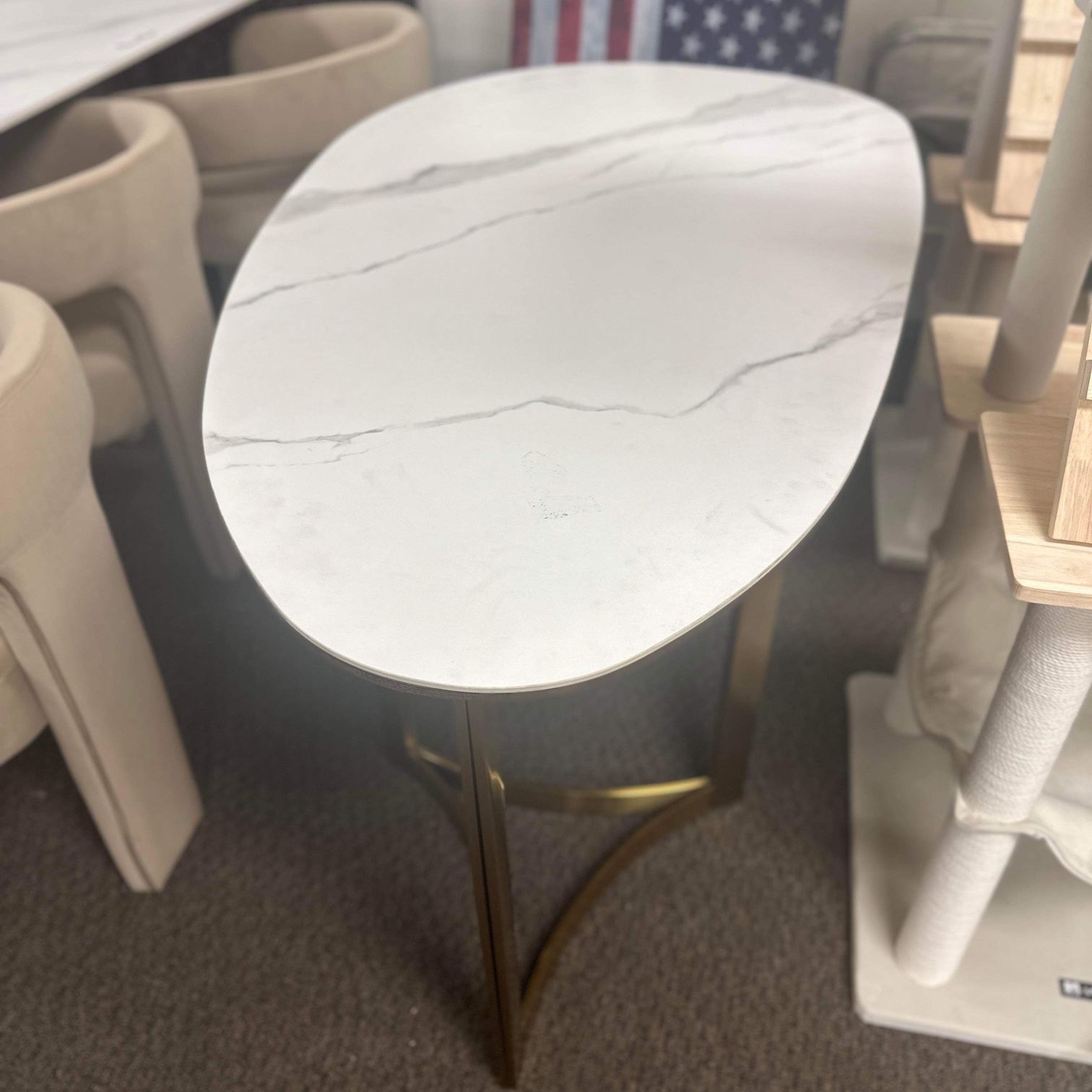 Oval White Marble and Metal Leg Dining Table (L: 55inches W: 30.5inches H: 29inches) 