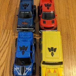 Set Of 4 Toy Trucks