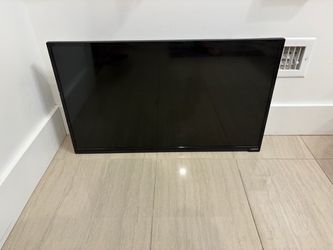 32” TV including wall bracket