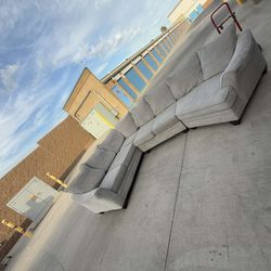 Light gray L-shaped sectional sofa