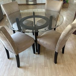 Glass Top Table And Four Chairs
