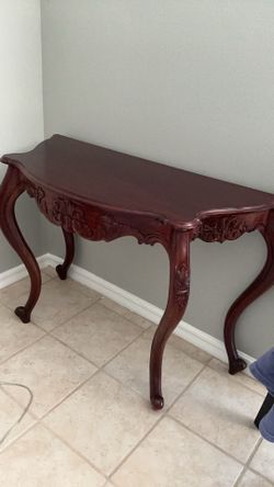 Mahogany table and mirror.