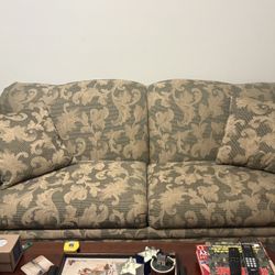 Fabric Loveseat Sofa With  Green And Yellowish Gold  Flower DesignLoveseat Sofa With Metal Folding Bed 