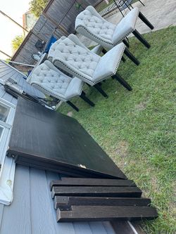 Dark Wood Dining Table with 4 Tufted Chairs