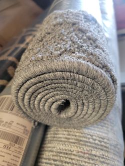5-by-7-foot Mohawk Home area rug made from stain-resistant olefin fiber