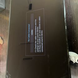 82 In Samsung Tv With Cords And Controller 