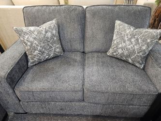 Brand new dark gray chenille loveseat (61.42 x 35.83 x 35.83 in. H)