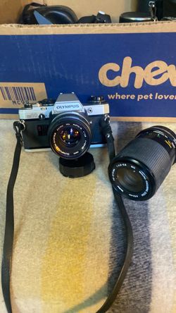 Vintage Olympus OM10 35mm film camera with 70-200mm macro zoom