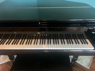 Baby Grand Young Chang Puano