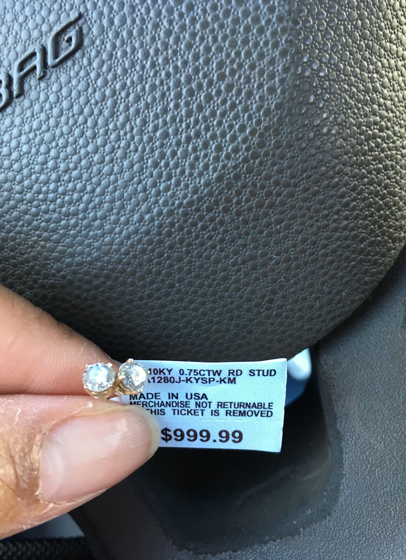 Genuine diamond earrings .75 carat