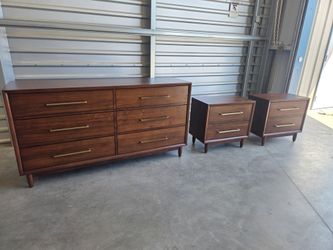New MARINA DEL REY DRESSER AND NIGHTSTANDS

Constructed of Hardwood Solids and Walnut Veneers
Six Drawers for Storage
Premium Soft-Close Drawer Glides