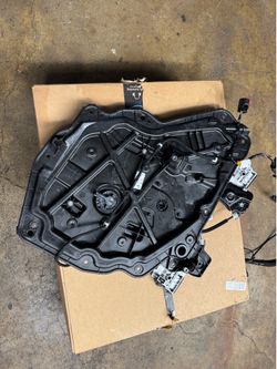 Tesla Y rear left door window regulator panel