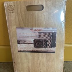 New wooden cutting board. Nice quality.