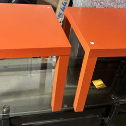 Cool pair of IKEA bright orange side tables in fair condition.