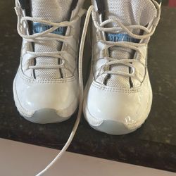 Toddler Jordan’s blue and white patent leather 