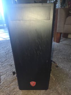 Gaming PC tower, motherboard, power supply and memory.