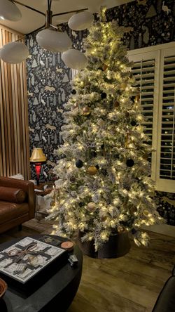 9 ft pre-lit Flocked Christmas Tree