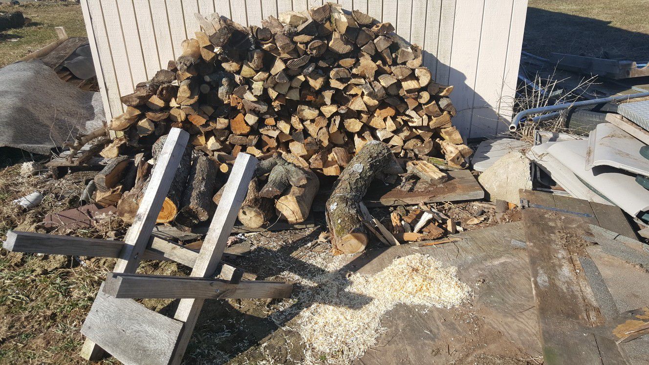 Seasoned fire wood,cut /split ,ready for that backyard fire pit 70$ a truck load.great for the family.