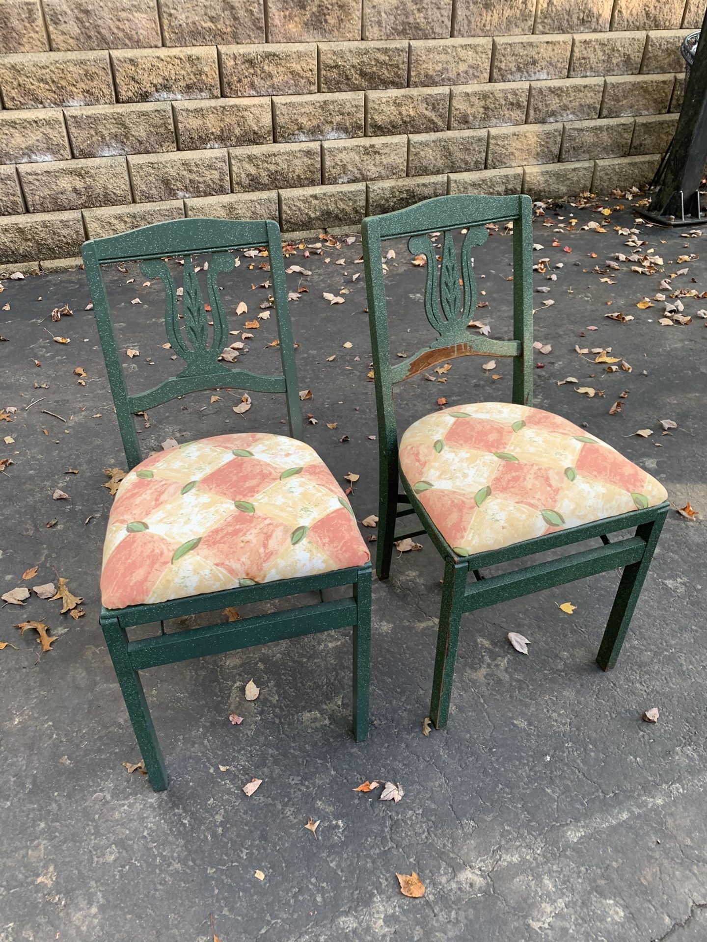 2 wooden folding chairs