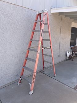 Louisville 8 ft Fiberglass Ladder - very sturdy - holds up to 300 lbs.