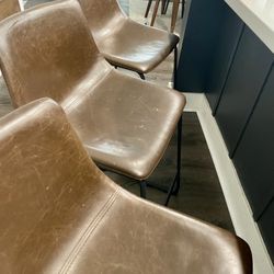 3 Brown And black Faux Leather Counter Stools